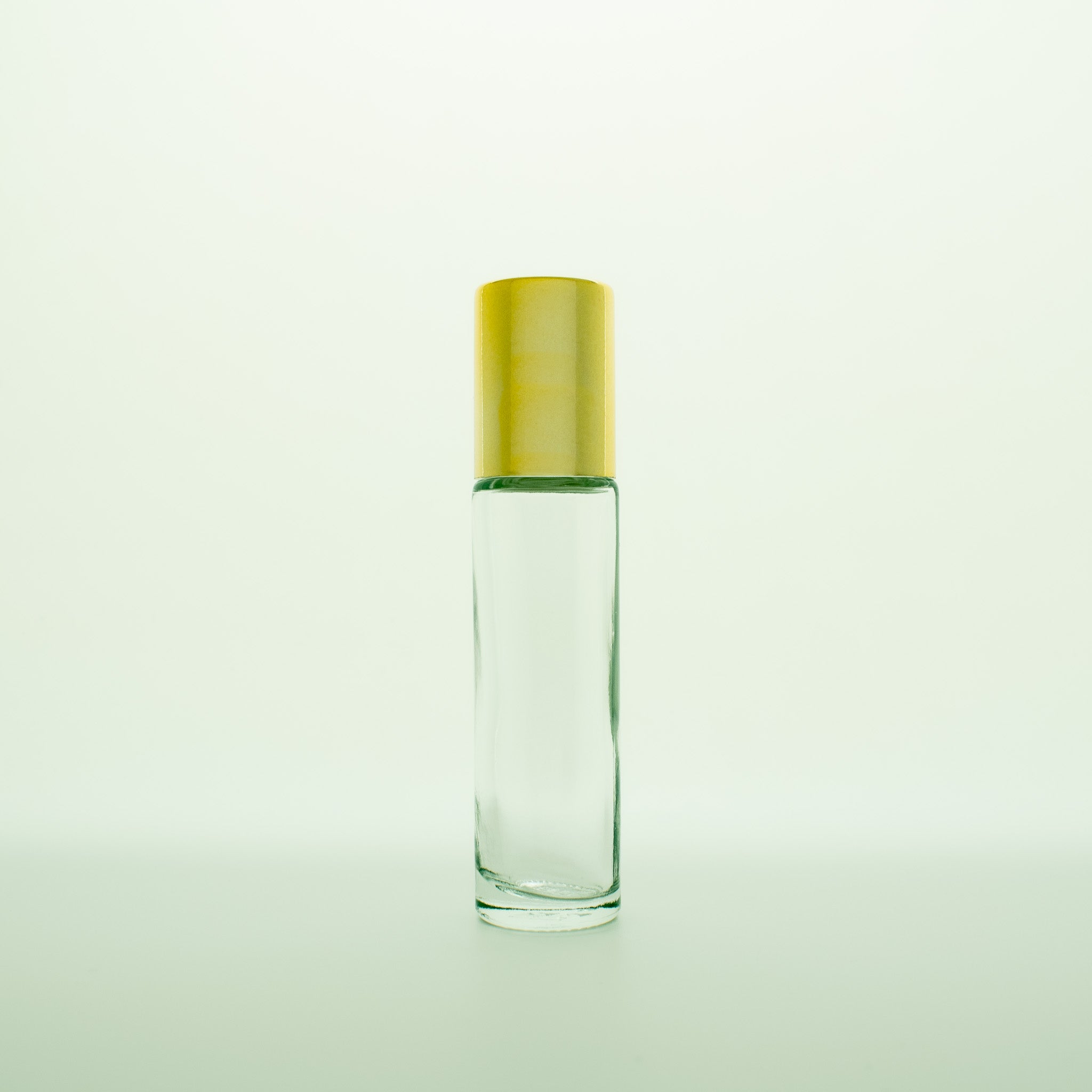 Roller flesje, 10 ml, van transparant kleurig glas met gouden dop